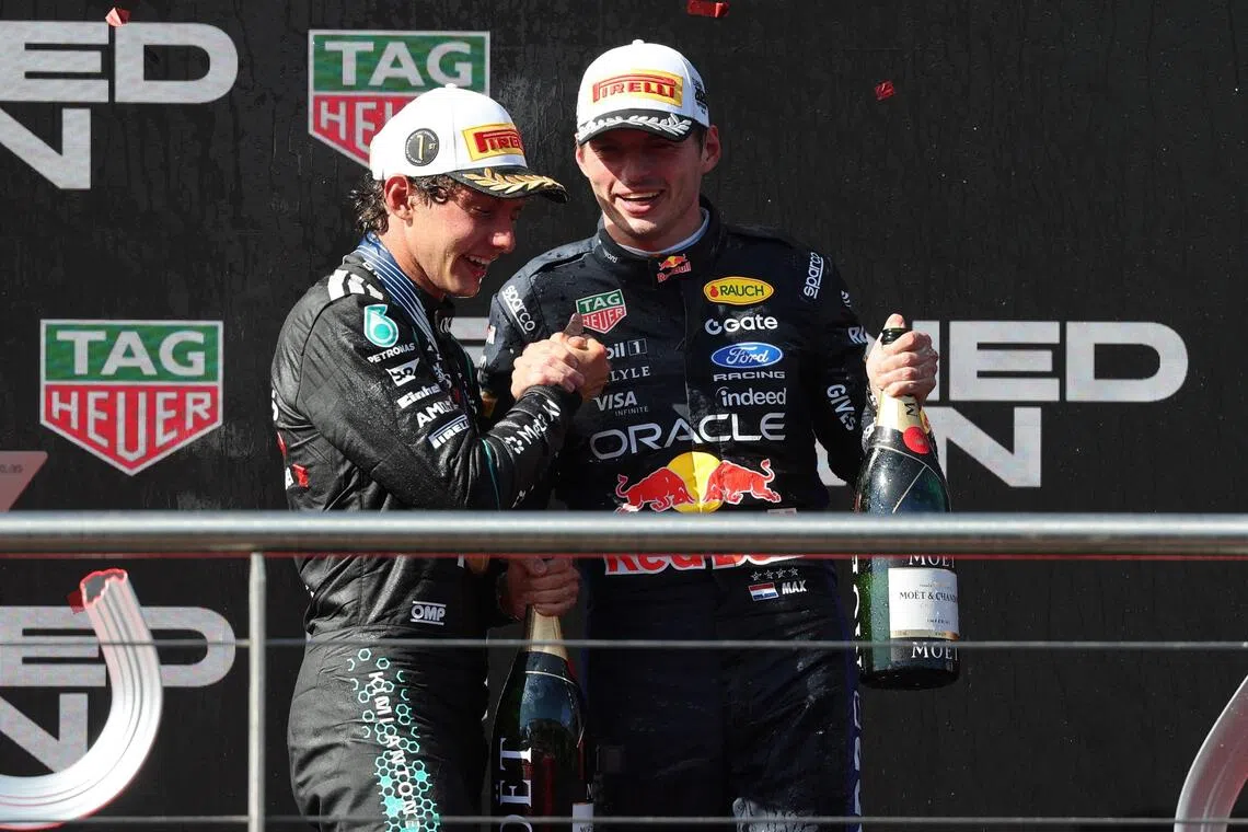 Mercedes’ Spanish Formula 1 Grand Prix winner, Italian driver Kimi Antonelli (left), and Red Bull’s second-placed Dutch driver Max Verstappen celebrating on the Madring circuit podium on Sept 13, in Madrid.