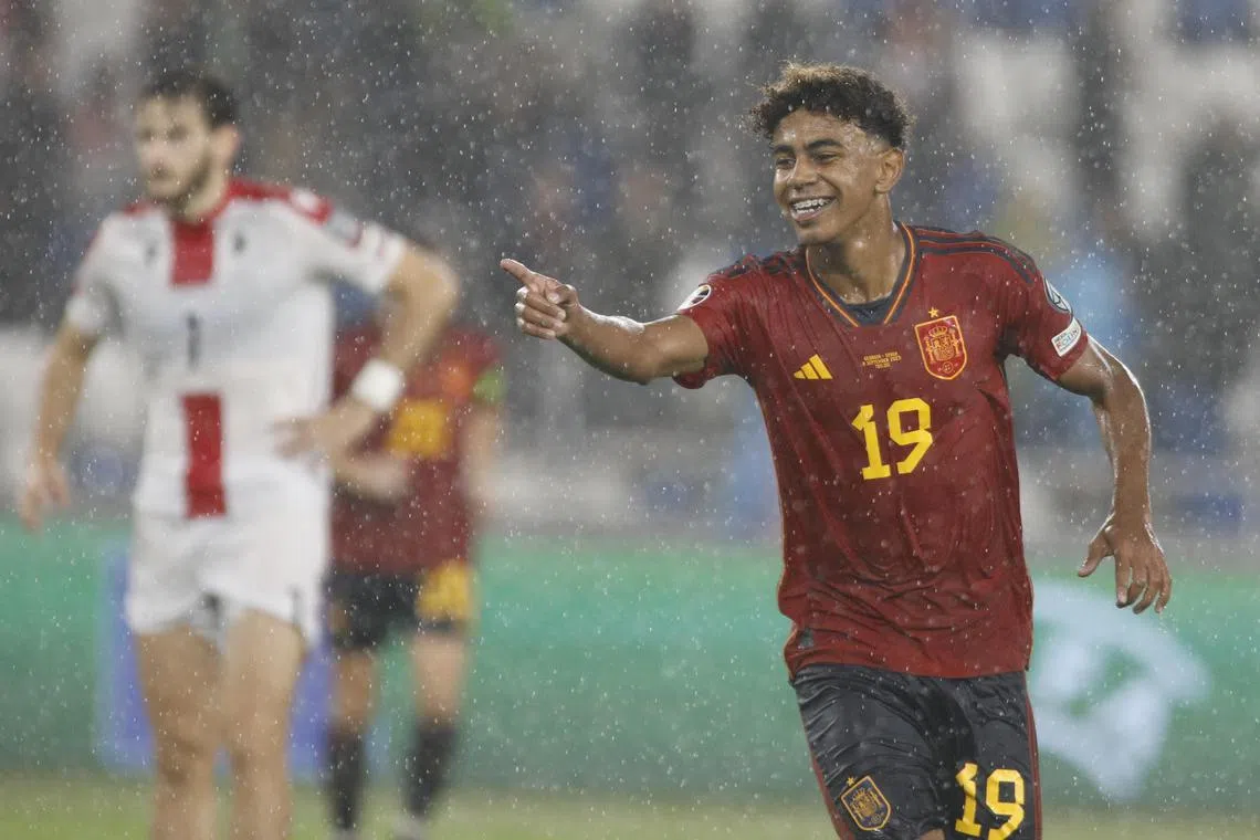 Lamine Yamal of Spain celebrates after scoring against Georgia in their Euro 2024 qualifier.
