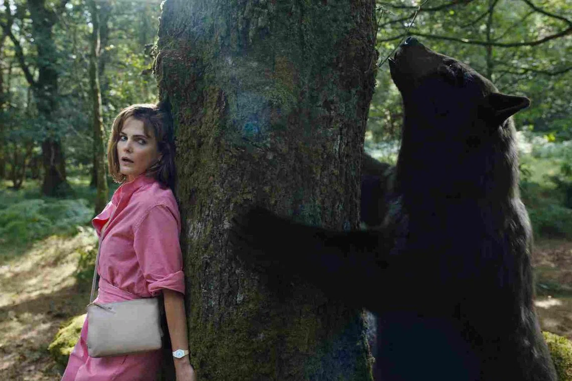 jobear23 - The black comedy Cocaine Bear stars Keri Russell (in pink) as a human who finds herself at the mercy of a rampaging, drug-crazed bear


Source: UIP