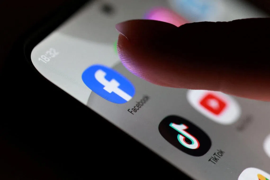 Social media apps are seen on a smartphone in this illustration taken October 27, 2025. REUTERS/Dado Ruvic/Illustration