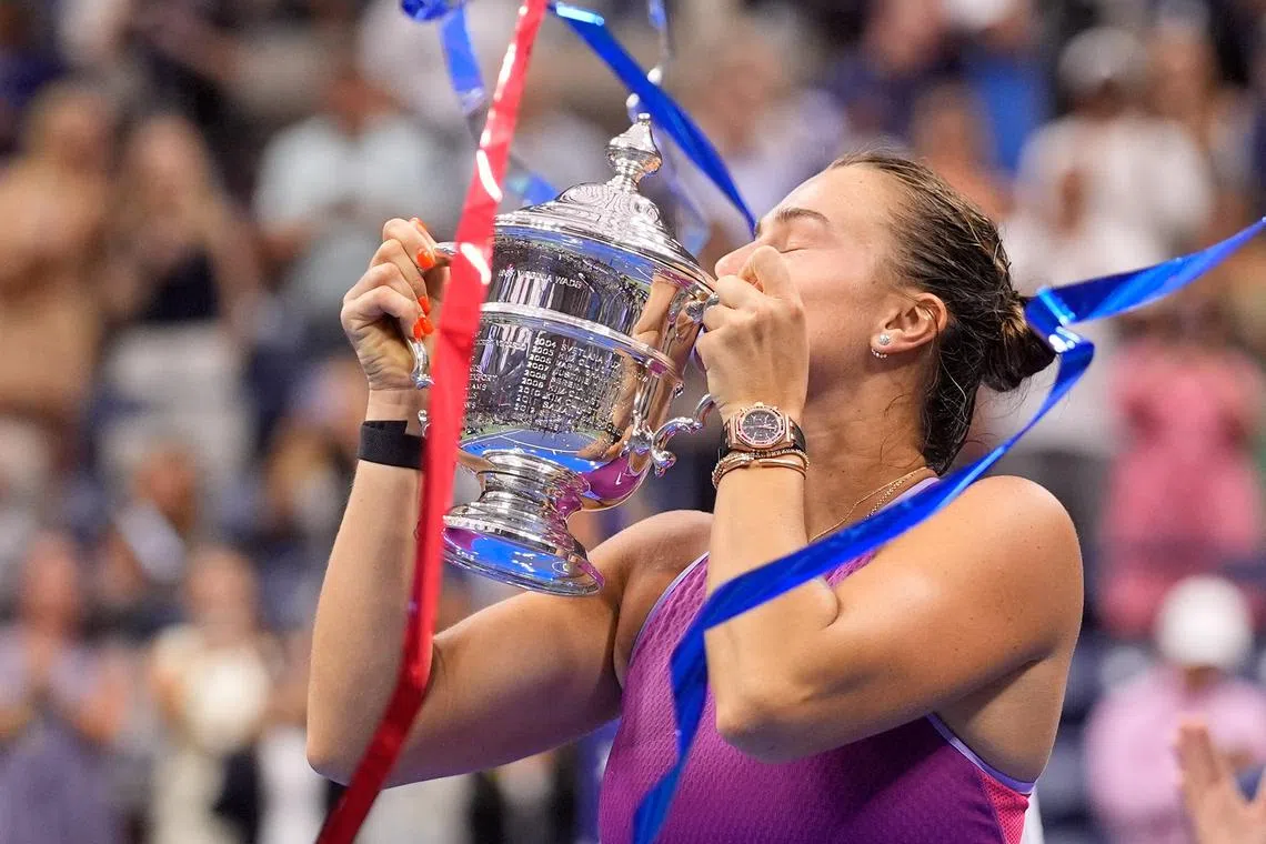 Sept 7, 2024; Flushing, NY, USA Aryna Sabalenka with the US Open Trophy after beating Jessica Pegula (USA) in the women's singles final on day thirteen of the 2024 U.S. Open tennis tournament at USTA Billie Jean King National Tennis Center. Mandatory Credit: Robert Deutsch