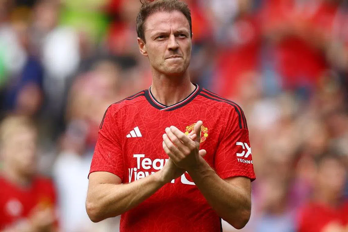 FILE PHOTO-Soccer Football - Pre Season Friendly - Manchester United v Olympique Lyonnais - Murrayfield Stadium, Edinburgh, Scotland, Britain - July 19, 2023 Manchester United's Jonny Evans applauds fans after the match Action Images via Reuters/Lee Smith/File Photo