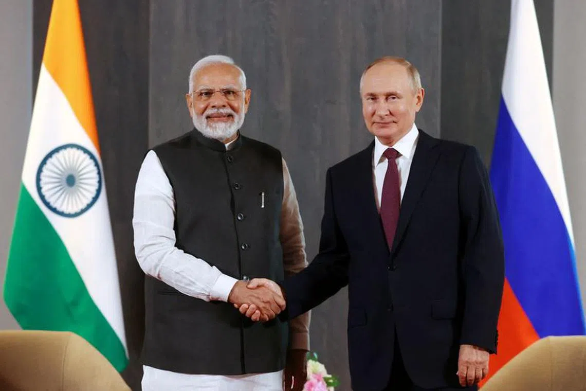 Russian President Vladimir Putin and Indian Prime Minister Narendra Modi attend a meeting on the sidelines of the Shanghai Cooperation Organization (SCO) summit in Samarkand, Uzbekistan September 16, 2022. Sputnik/Alexander Demyanchuk/Pool via REUTERS/File Photo