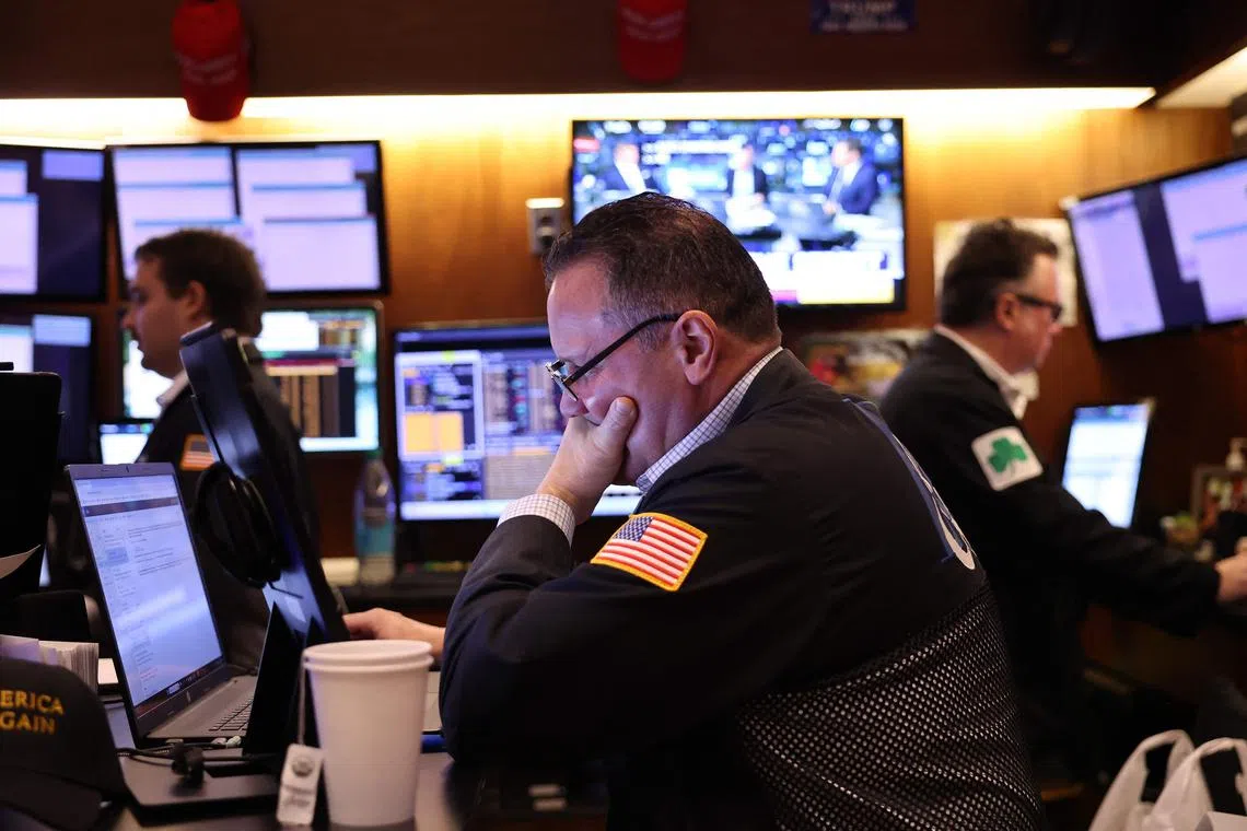 Traders working on the floor of the New York Stock Exchange, during morning trading on Nov 26, 2024 in New York City.