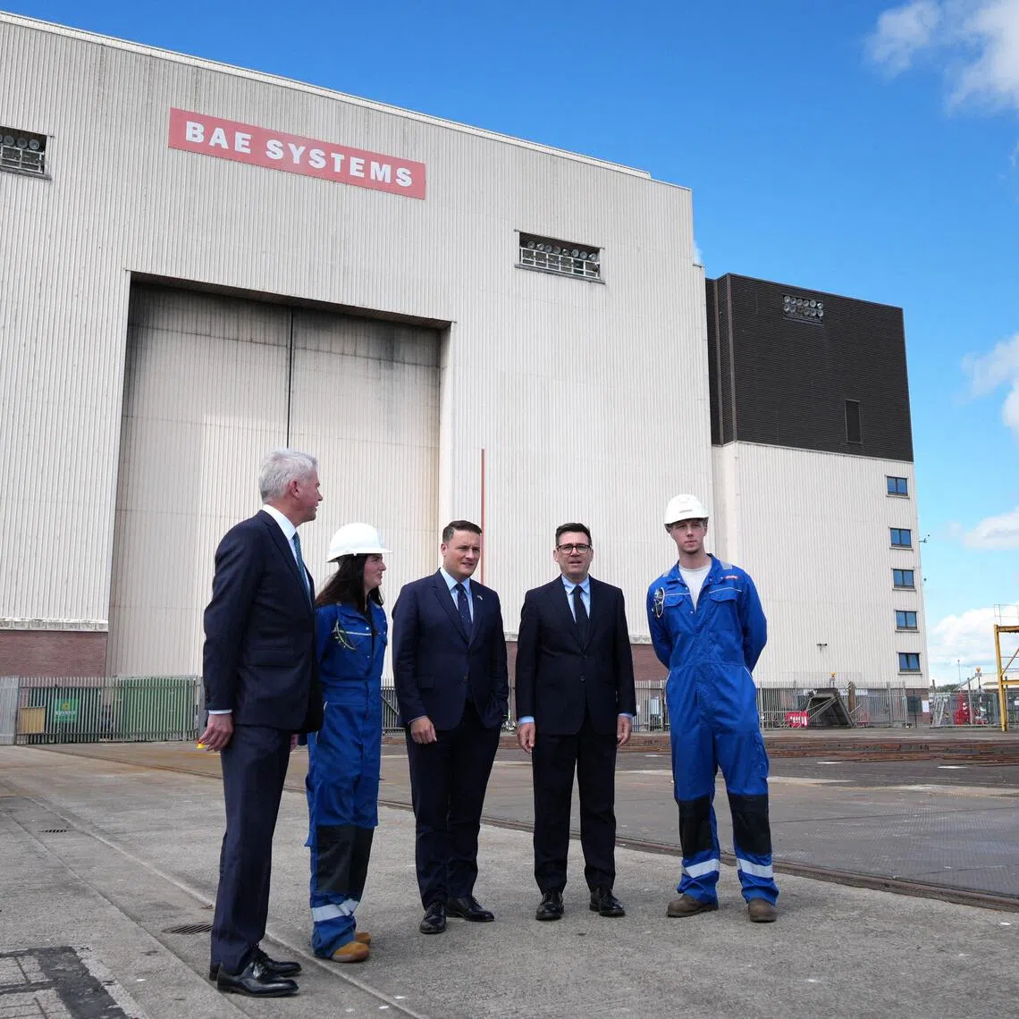 Britain’s Prime Minister Andy Burnham (second from right) and Defence Secretary Wes Streeting (centre) visiting the Submarine Academy for Skills and Knowledge (SASK), BAE Systems, on July 30.