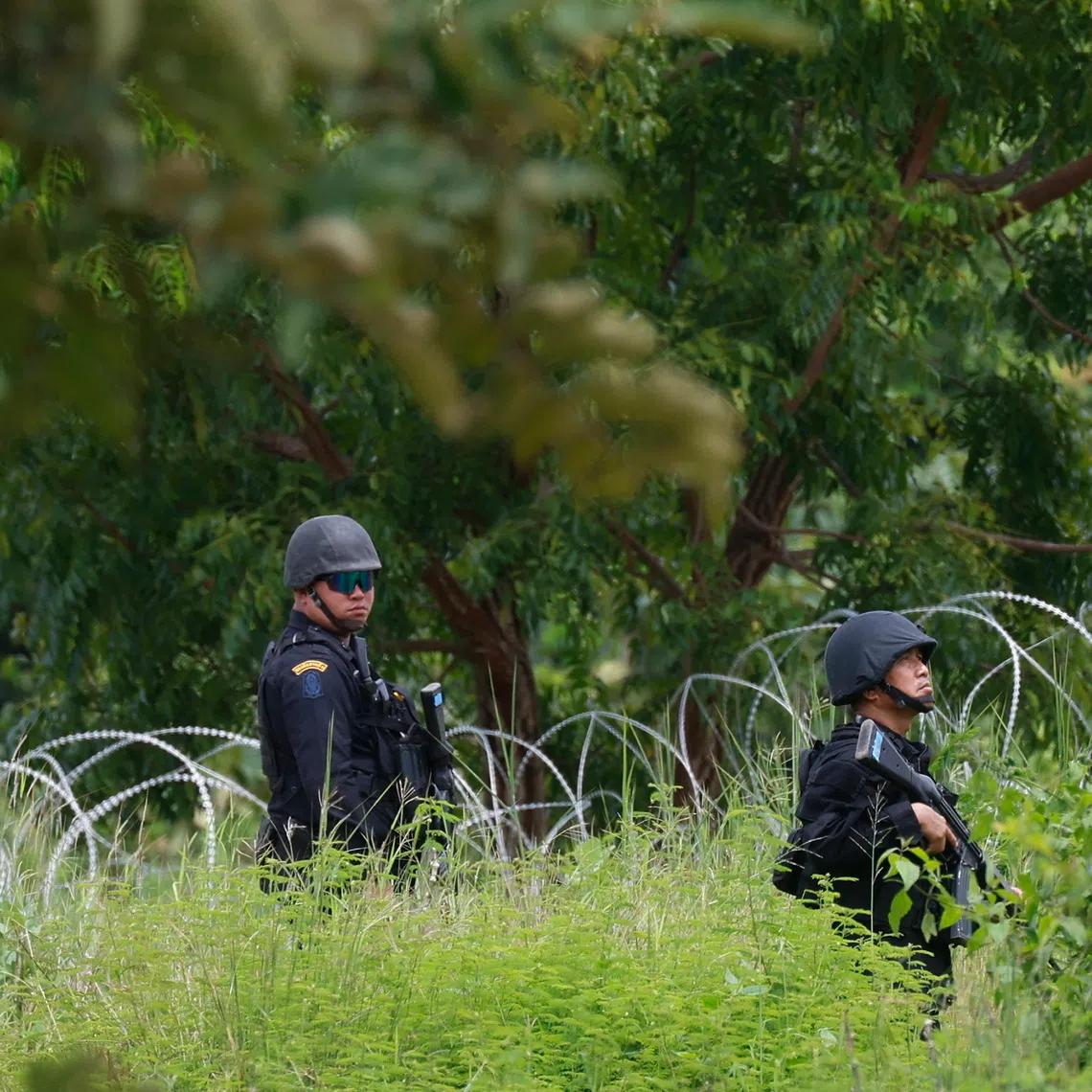 Thai rangers patrol along the Thai-Cambodian border at Ban Nong Ya Kaeo in Sa Kaeo province, Thailand, on Sept 19.
