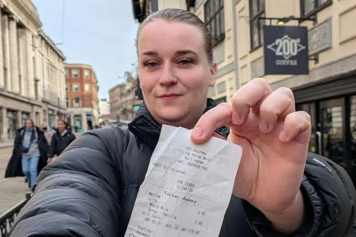 Ms Sophie Downing, a business owner in Nottingham, shows the receipt that gave her a wealth 22,500 times larger than the British economy.