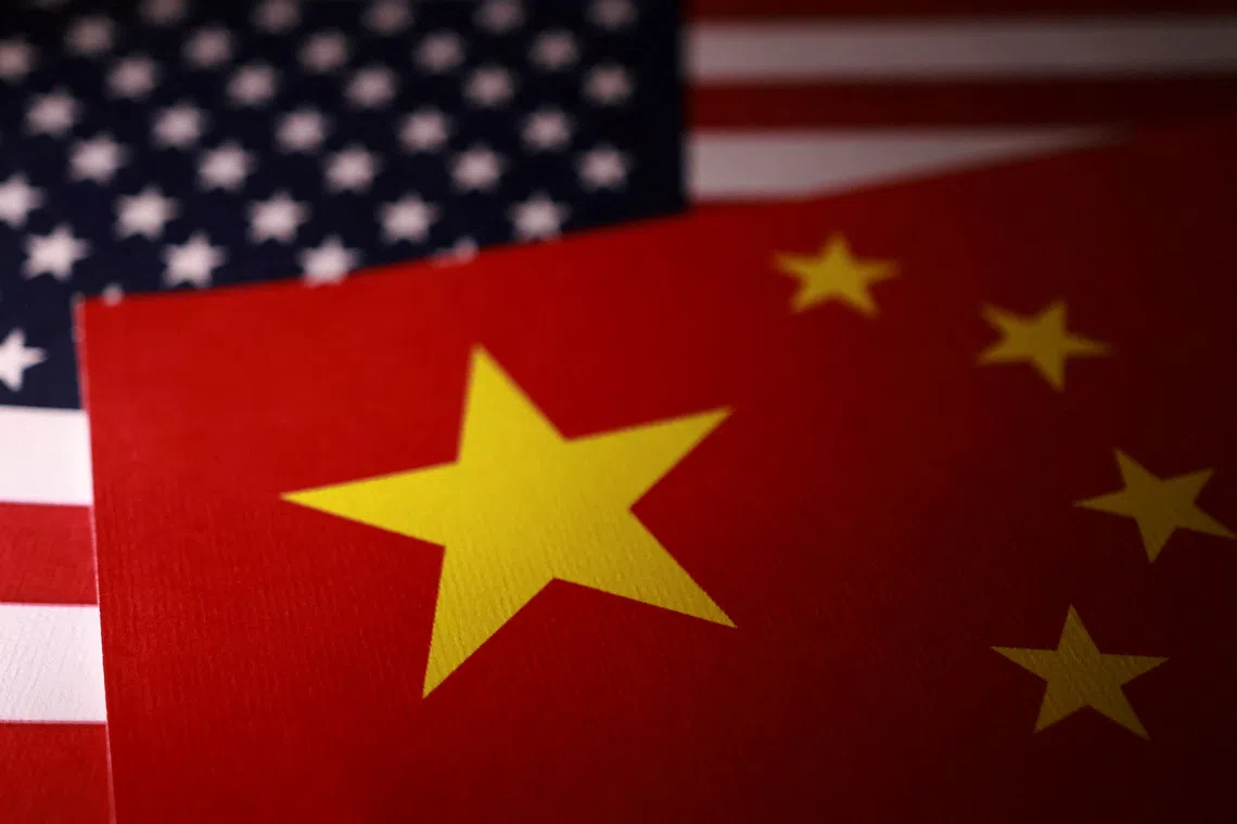 U.S. and Chinese flags are displayed in this illustration taken September 24, 2025. REUTERS/Dado Ruvic/Illustration