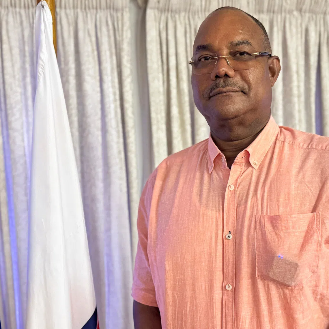 Leader of the United Seychelles (US) party Patrick Herminie poses for a photograph after a Reuters interview ahead of the upcoming general elections in Victoria, Seychelles, September 22, 2025. REUTERS/Gabriel Robert-Gironcelle