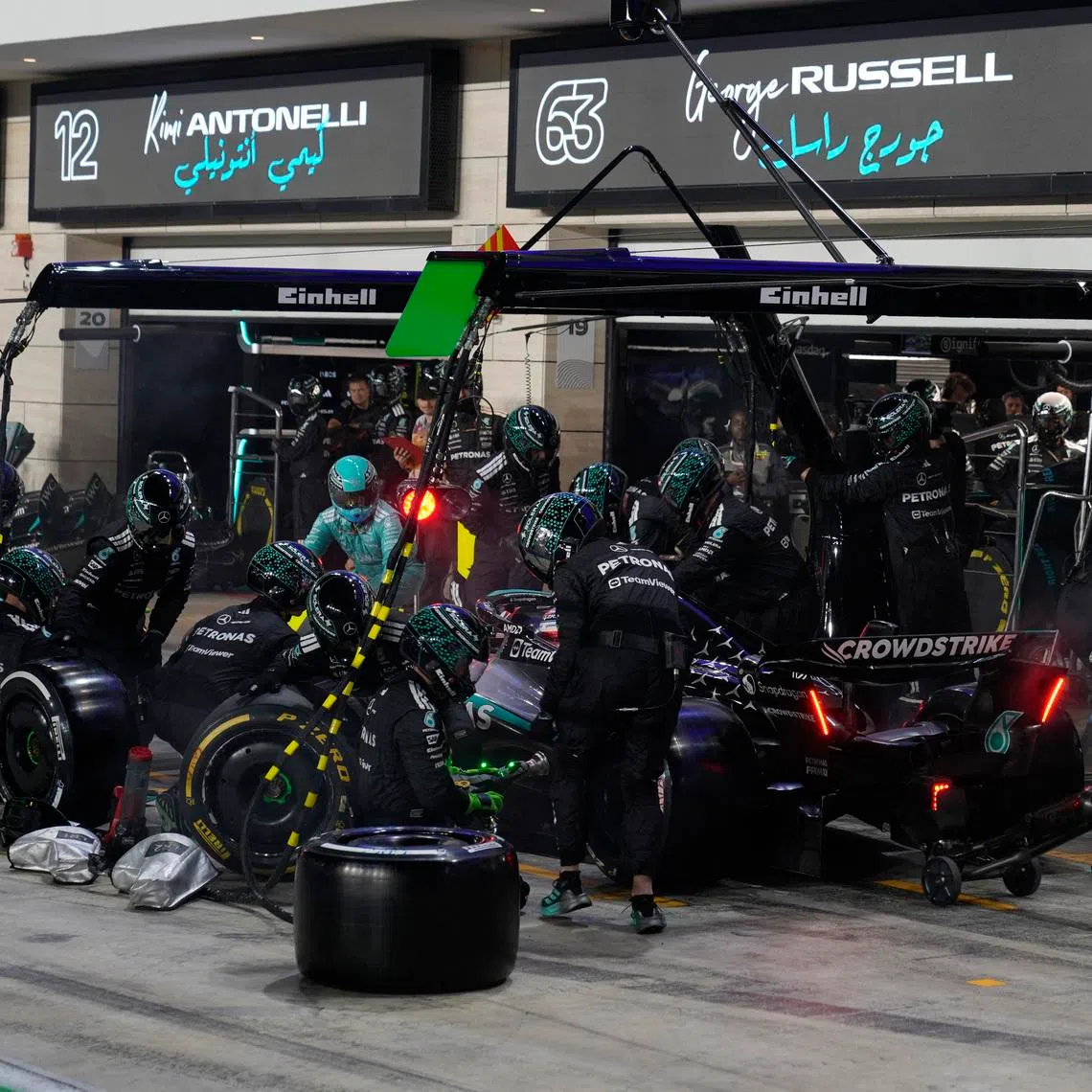 Formula One F1 - Qatar Grand Prix - Lusail International Circuit, Lusail, Qatar - November 30, 2025 Mercedes' George Russell pit stops during the race Pool via REUTERS/Altaf Qadri