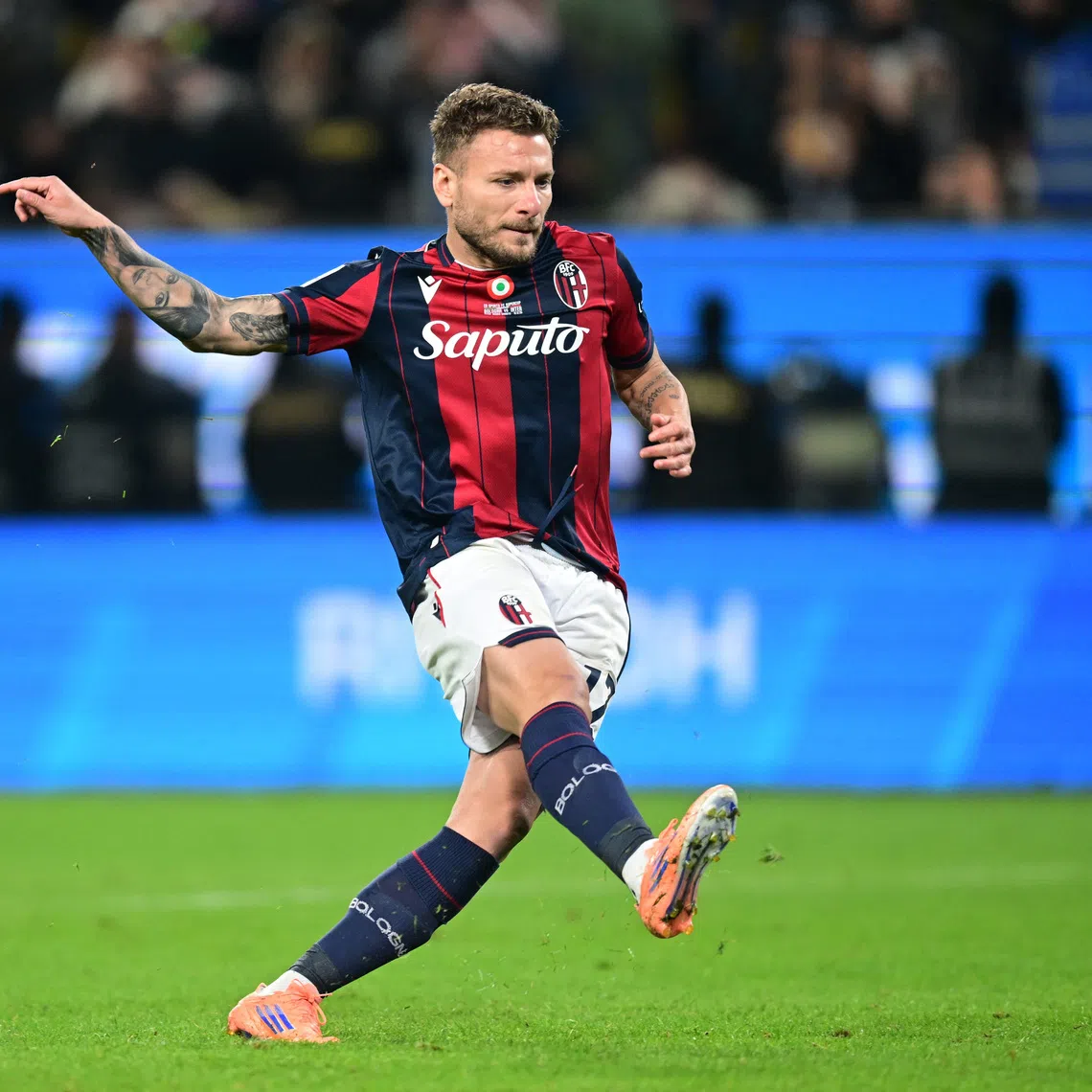 Soccer Football - Supercoppa Italiana - Semi Final - Bologna v Inter Milan - Al Awwal Park, Riyadh, Saudi Arabia - December 20, 2025 Bologna's Ciro Immobile scores the penalty to win the shoot-out REUTERS/Daniele Mascolo