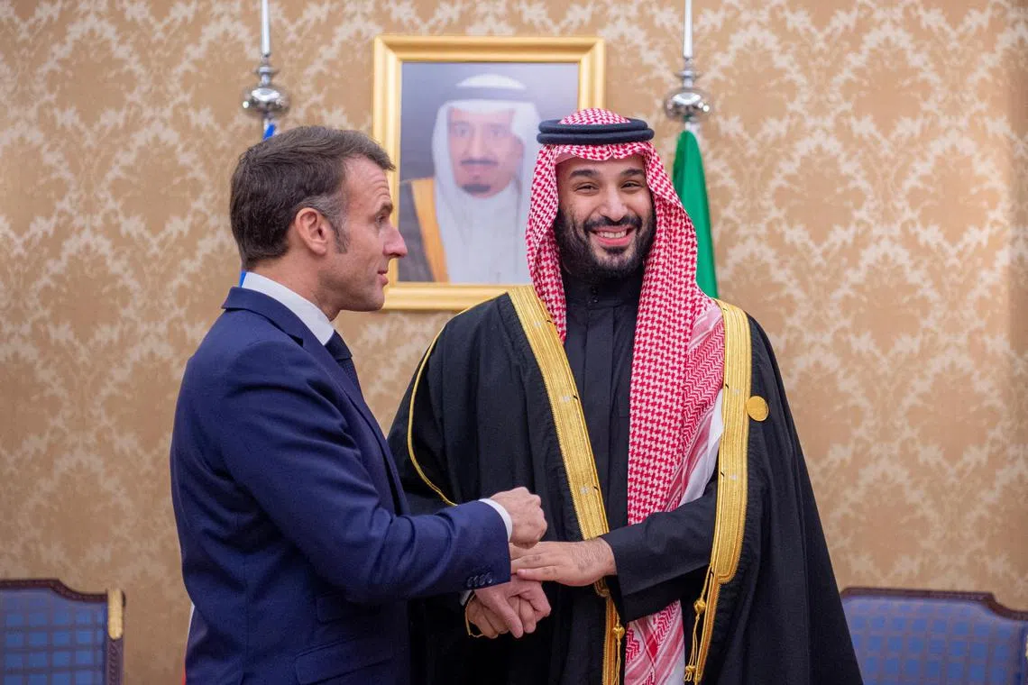 FILE PHOTO: Saudi Crown Prince Mohammed bin Salman meets with French President Emmanuel Macron in Riyadh, Saudi Arabia, December 3, 2024. Saudi Press Agency/Handout via REUTERS/File Photo