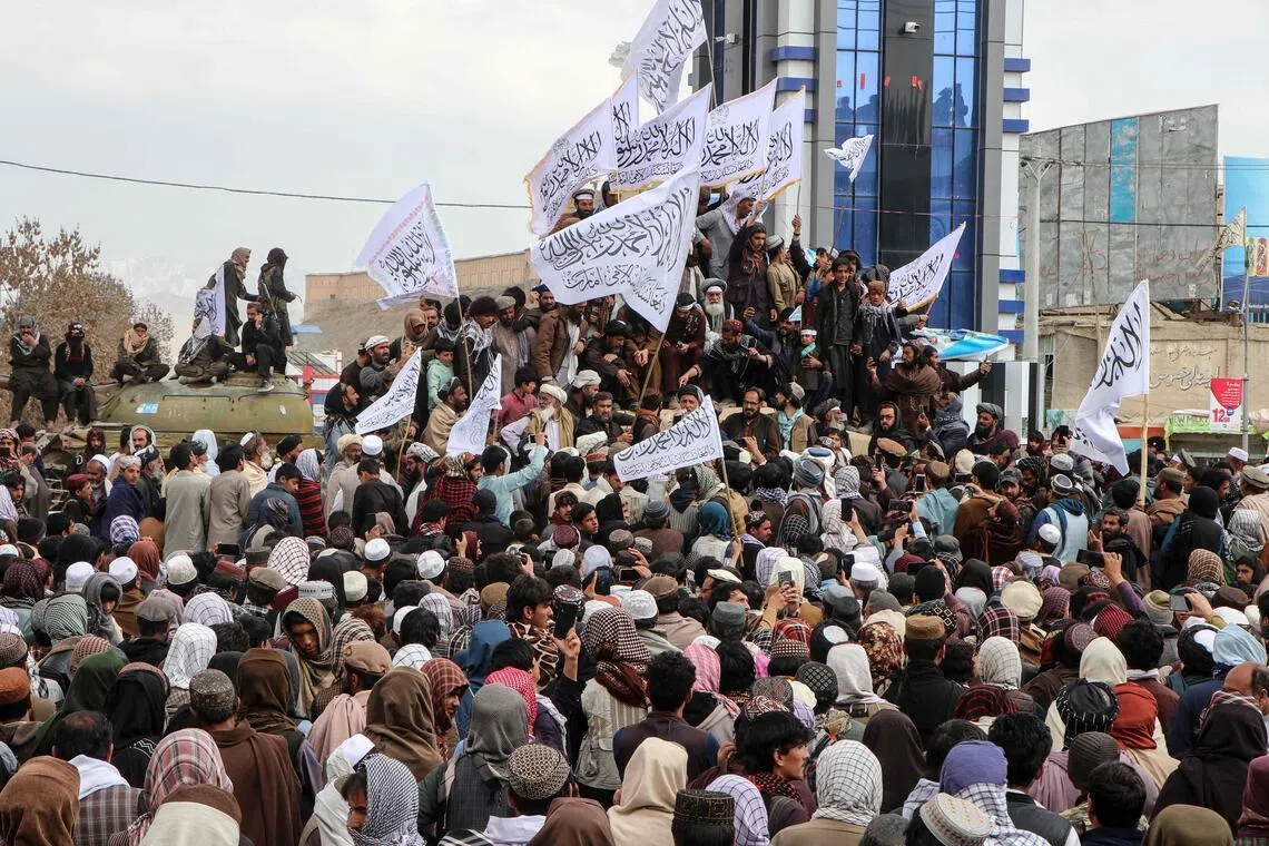 Afghan men gather to show their solidarity for the Taliban personnel in Gardez of Paktia province on March 4, amid ongoing cross-border conflict between Pakistan and Afghanistan.