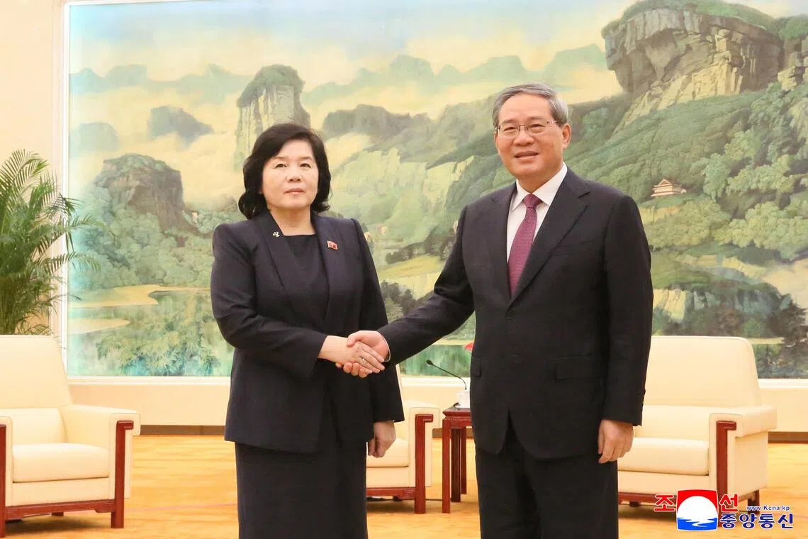 This undated picture released by North Korea's official Korean Central News Agency (KCNA) on September 30, 2025 shows North Korea's Foreign Minister Choe Son Hui (L) shaking hands with Chinese Premier Li Qiang (R) at the Great Hall of the People in Beijing. (Photo by KCNA VIA KNS / AFP) / South Korea OUT / ---EDITORS NOTE--- RESTRICTED TO EDITORIAL USE - MANDATORY CREDIT "AFP PHOTO/KCNA VIA KNS" - NO MARKETING NO ADVERTISING CAMPAIGNS - DISTRIBUTED AS A SERVICE TO CLIENTS
THIS PICTURE WAS MADE AVAILABLE BY A THIRD PARTY. AFP CAN NOT INDEPENDENTLY VERIFY THE AUTHENTICITY, LOCATION, DATE AND CONTENT OF THIS IMAGE. / 