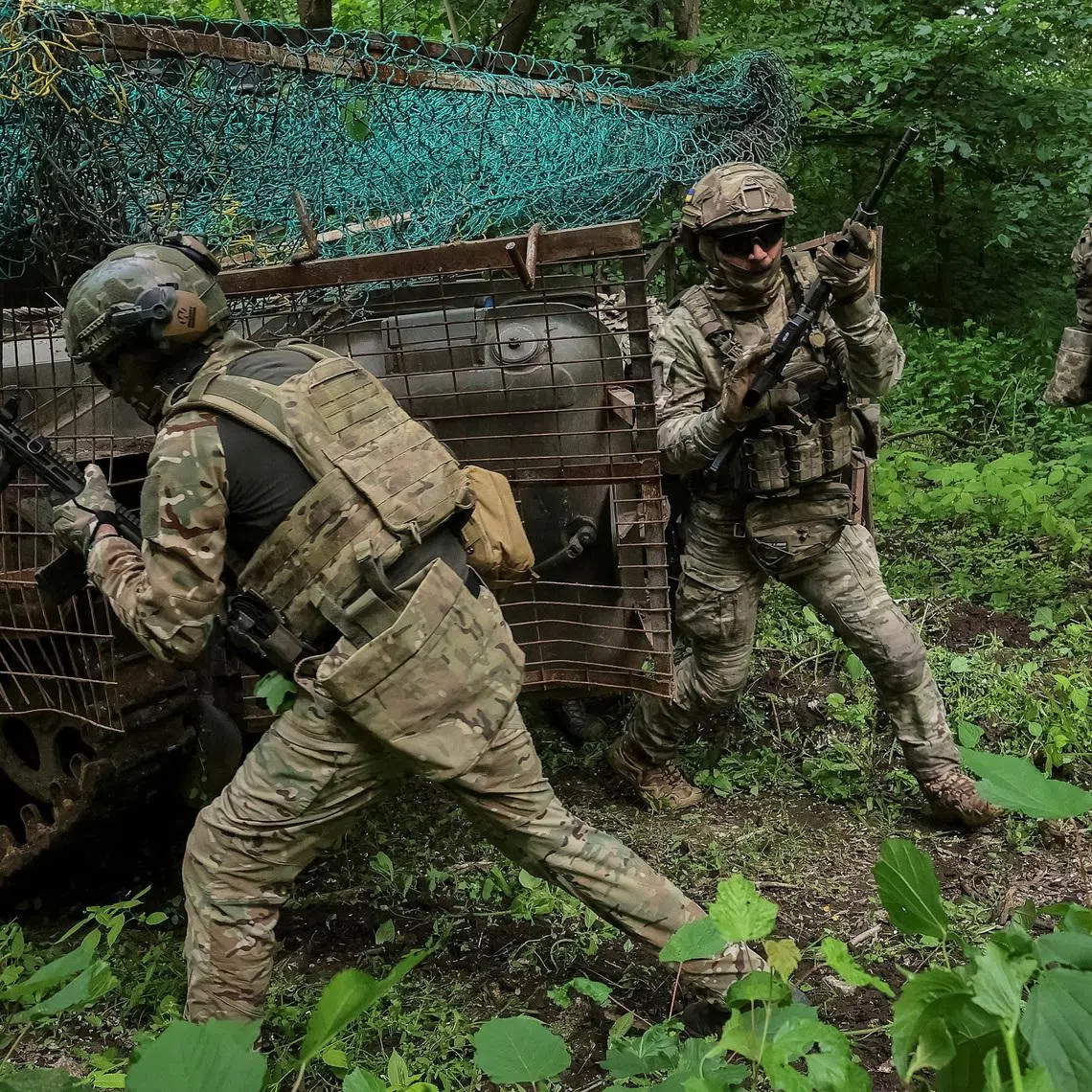 Service members of the 13th Operative Purpose Brigade 'Khartiia' of the National Guard of Ukraine attend an exercise between combat missions, amid Russia's attack on Ukraine, in Kharkiv region, Ukraine May 29, 2026. REUTERS/Vyacheslav Madiyevskyy