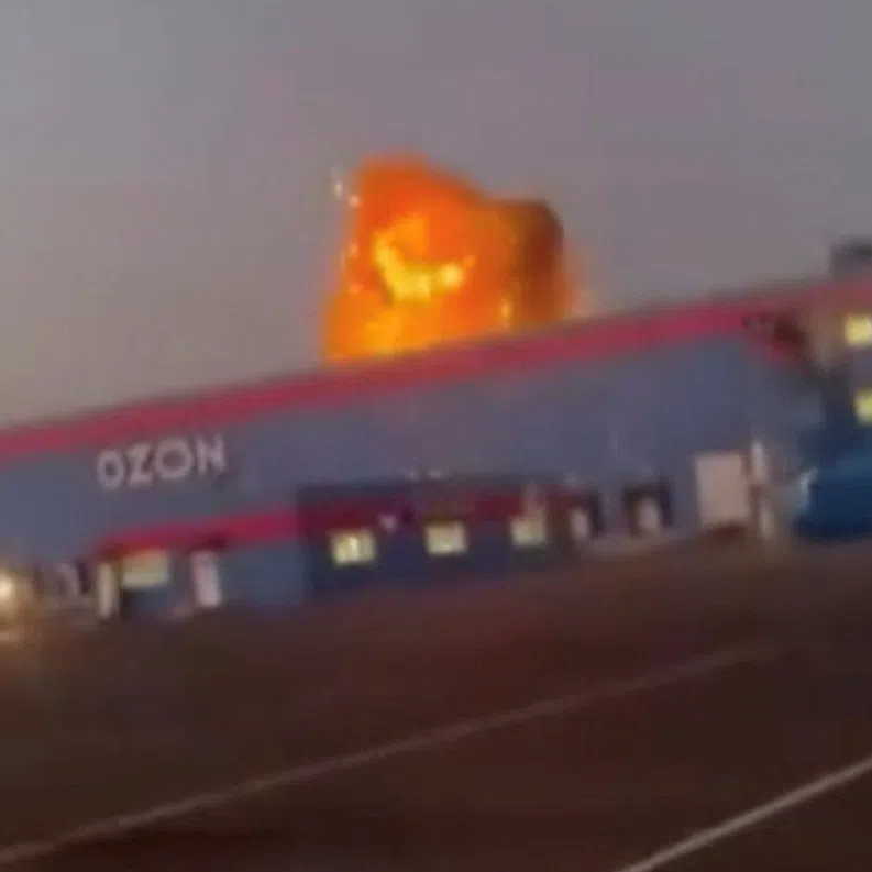 A screengrab shows flames rising from an Ozon facility following a Ukrainian drone strike, in Makhachkala, Dagestan, Russia.