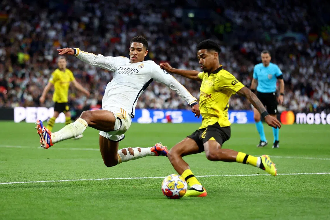 FILE PHOTO: Soccer Football - Champions League - Final - Borussia Dortmund v Real Madrid - Wembley Stadium, London, Britain - June 1, 2024 Borussia Dortmund's Ian Maatsen in action with Real Madrid's Jude Bellingham REUTERS/Carl Recine/File Photo