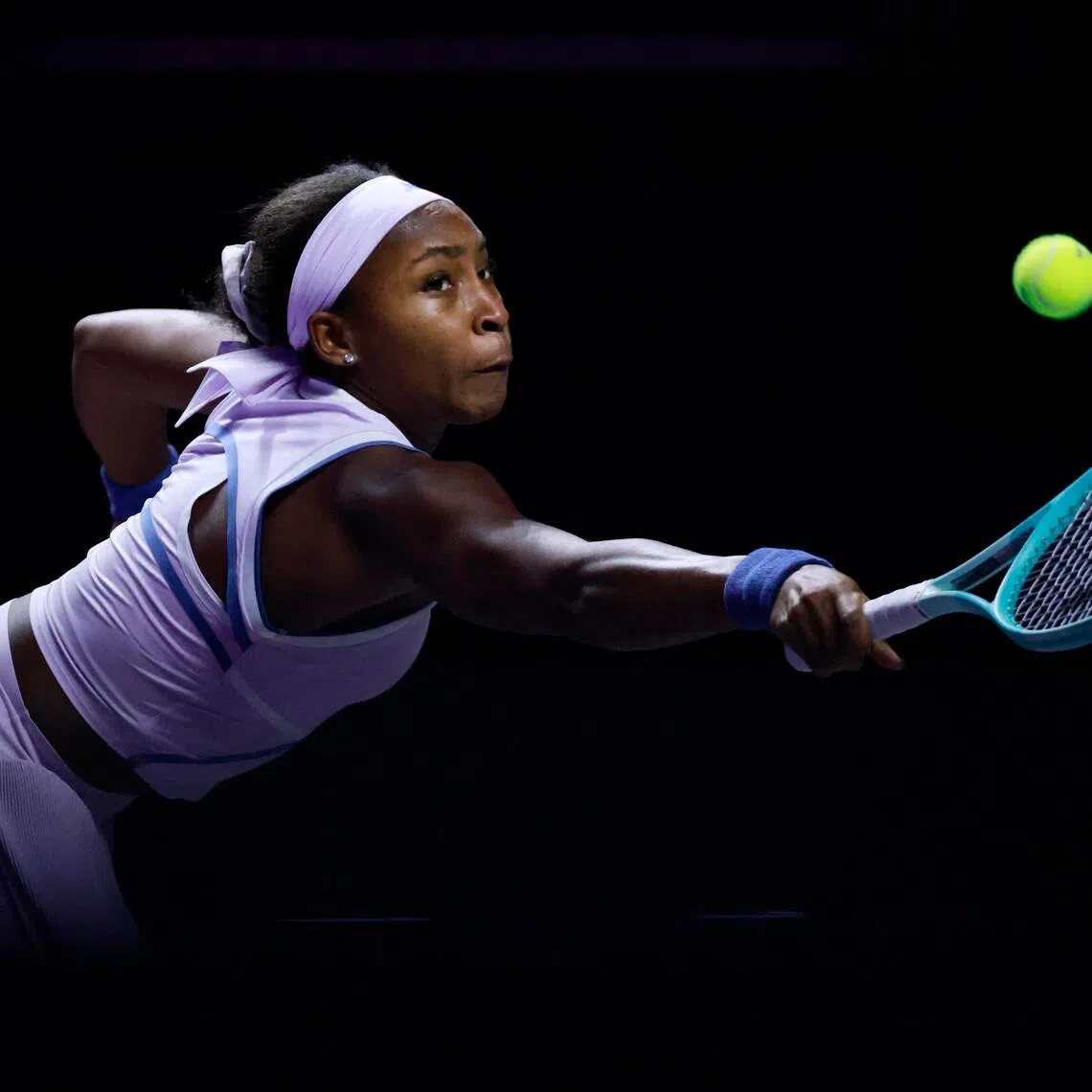 Coco Gauff of the US in action during her 6-3, 6-2 WTA Finals group-stage win over Italy's Jasmine Paolini at King Saud University Indoor Arena in Riyadh on Nov 4, 2025.