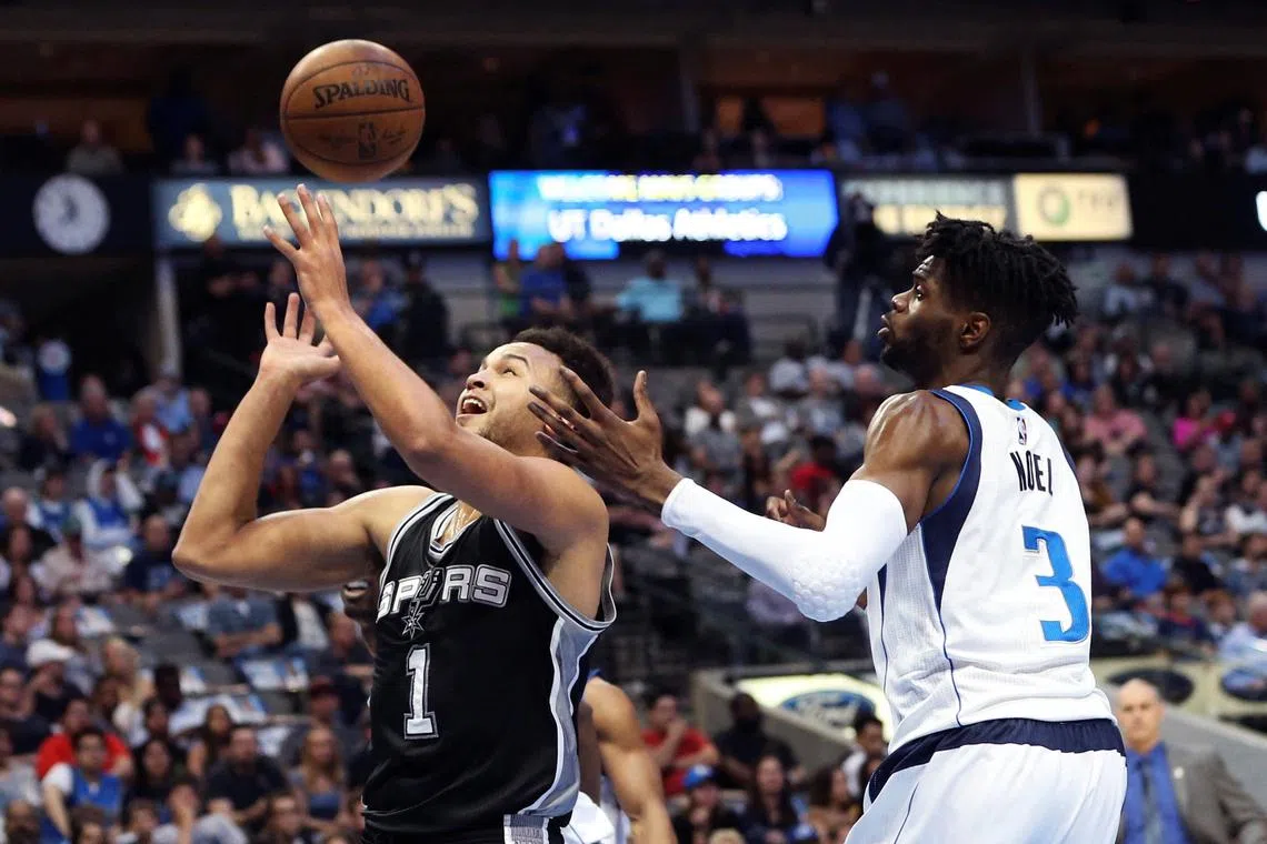 Kyle Anderson (No. 1), pictured in action for the San Antonio Spurs in 2017, has become a Chinese citizen. 