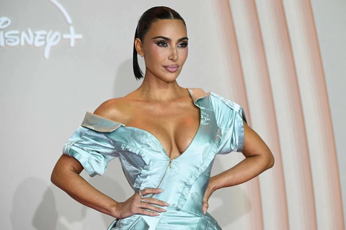 US reality TV personality Kim Kardashian poses during a photocall for the premiere of her TV series All’s Fair in Paris, France on Oct 21, 2025. 