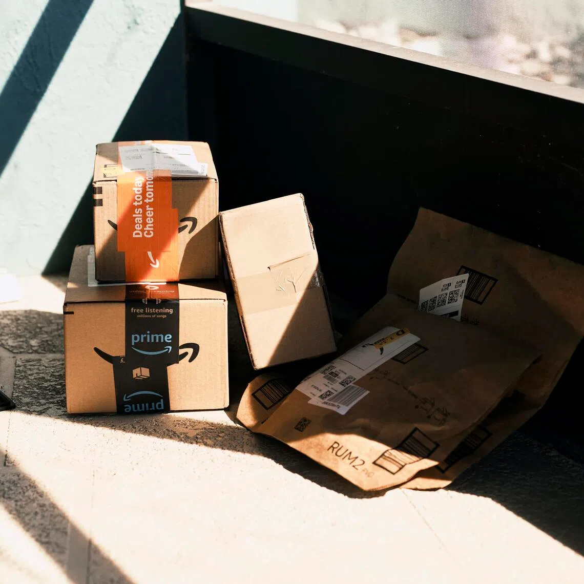 Newly-arrived packages from Amazon outside Kristen ContiÕs home in Englewood, Fla., on Nov. 21, 2025. Conti sought help after spending more than $1,000 on Labubu dolls and Christmas decorations. She has over $50,000 in credit card debt. (Zack Wittman/The New York Times)