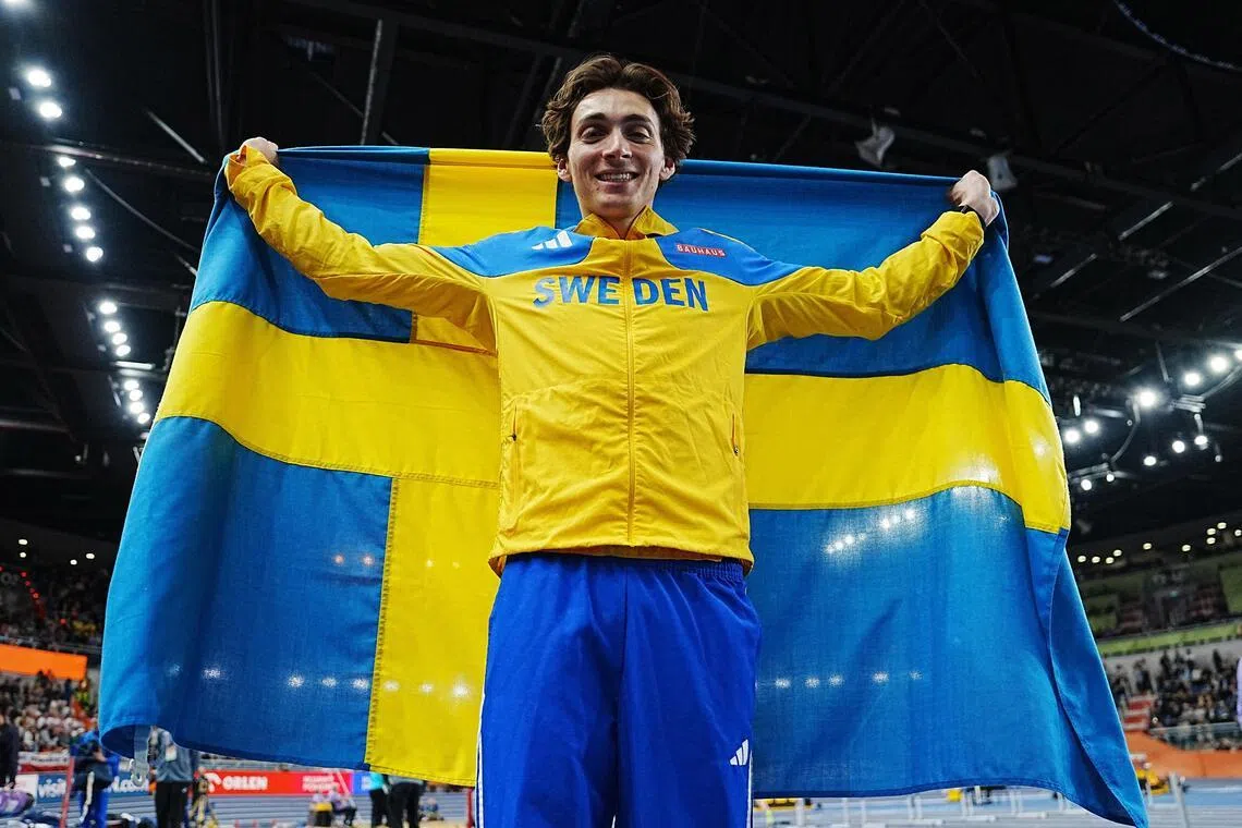 Sweden's Armand Duplantis celebrates winning the men's pole vault final at the World Athletics Indoor Championships.