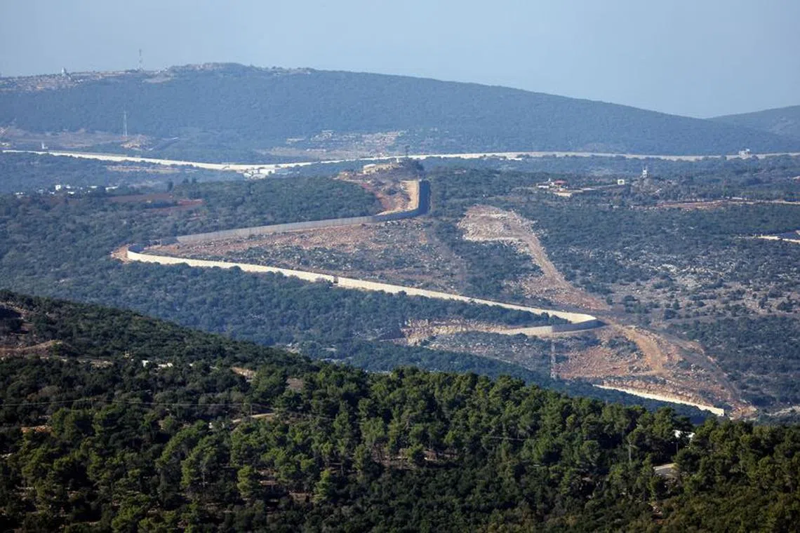 FILE PHOTO: A general view shows the border between Israel and Lebanon as seen from the Israeli side, November 4, 2023. REUTERS/Alexander Ermochenko/File Photo
