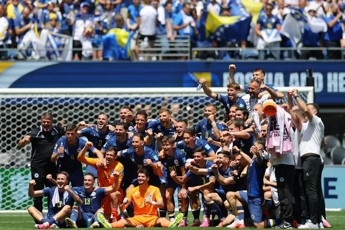 Soccer Football - FIFA World Cup 2026 - Group B - Bosnia and Herzegovina v Qatar - Seattle Stadium, Seattle, Washington, U.S. - June 24, 2026 Bosnia and Herzegovina players celebrate after the match REUTERS/Carlos Barria