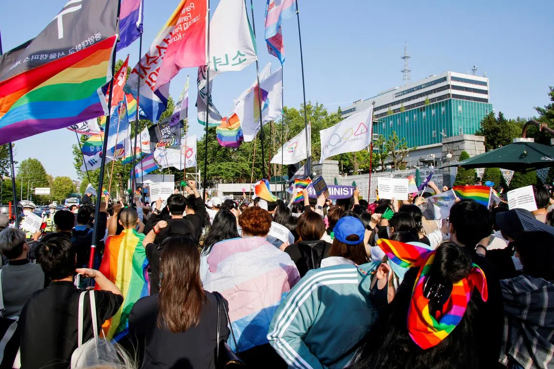 FILE PHOTO: Members of the LGBTQ+ community march in front of the new Presidential office during a protest ahead of the International Day Against Homophobia, Transphobia and Biphobia, in Seoul, South Korea, May 14, 2022.  REUTERS/Heo Ran/File Photo