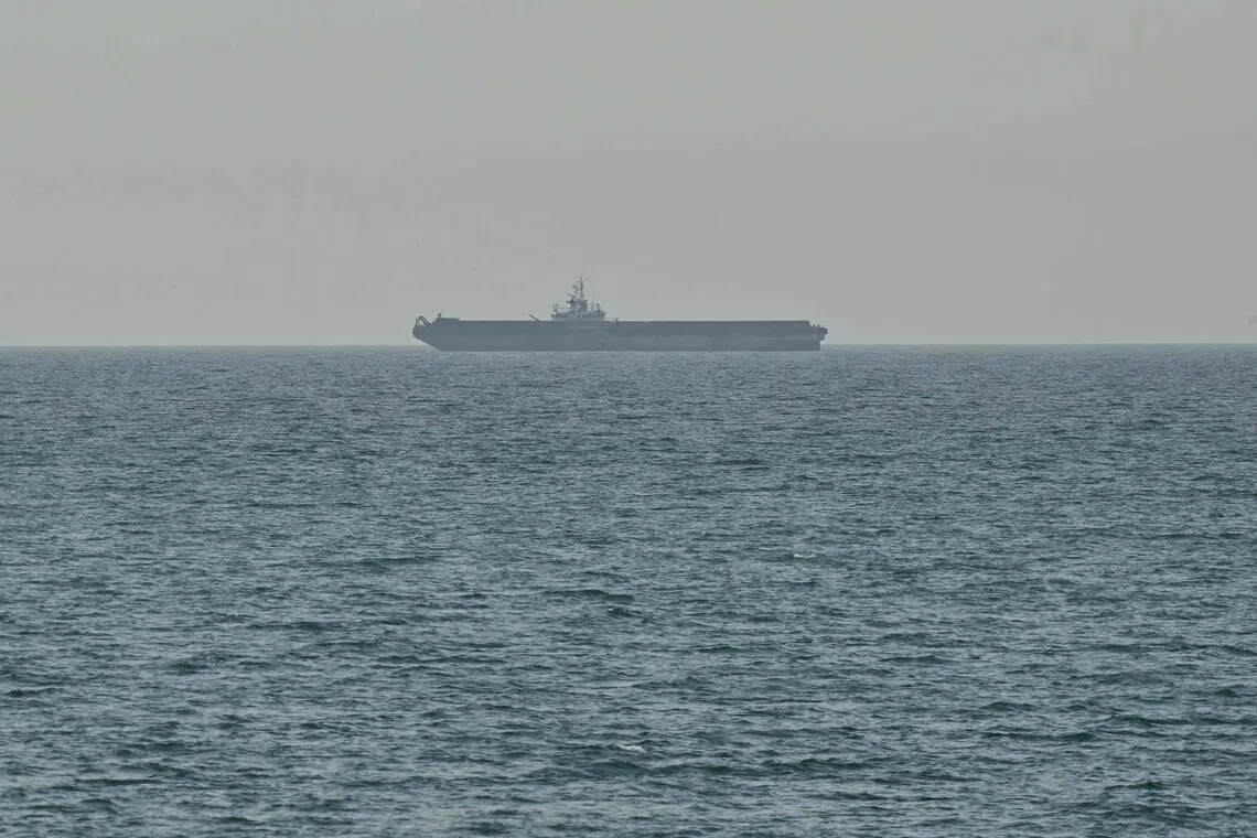 Iran weighs pausing its Hormuz shipping to avoid derailing talks