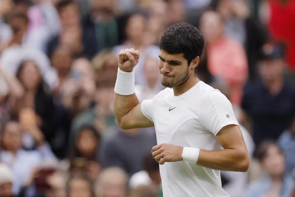 Spain’s Carlos Alcaraz celebrates winning his first-round match against France’s Jeremy Chardy.