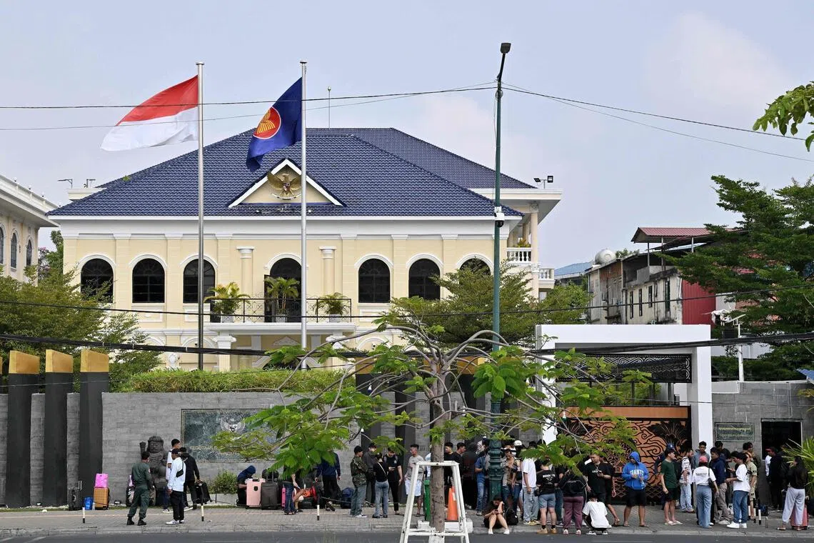 People gather in front of the Indonesian Embassy in Phnom Penh on Jan 19.