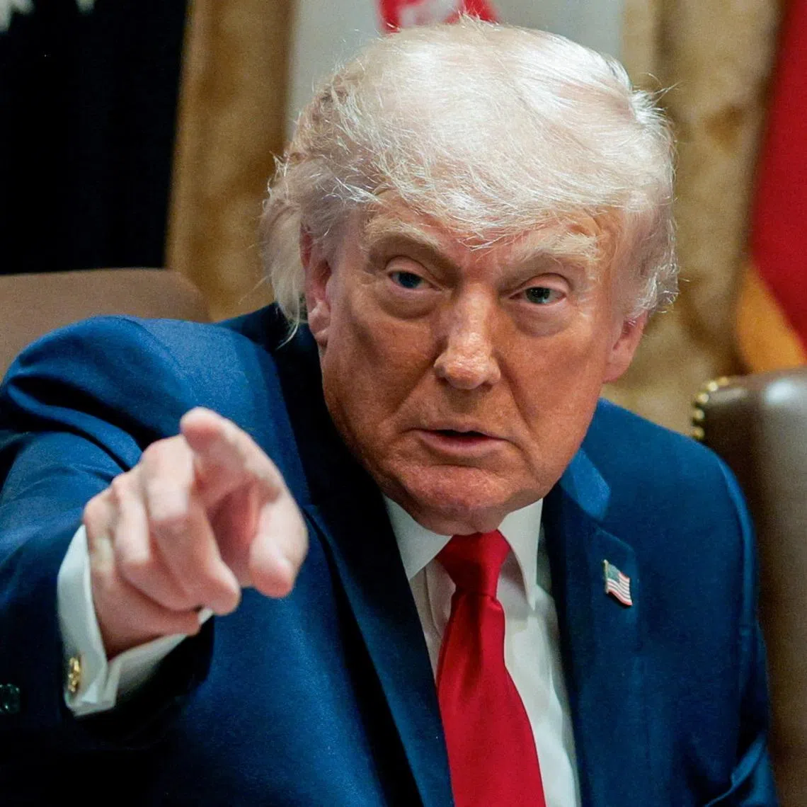 FILE PHOTO: U.S. President Donald Trump points his finger during a cabinet meeting in the Cabinet Room at the White House, in Washington, D.C., U.S., May 27, 2026. REUTERS/Evan Vucci