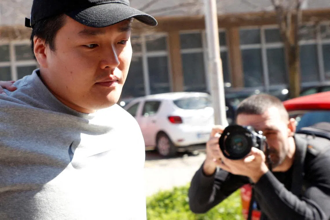 Do Kwon, the cryptocurrency entrepreneur, who created the failed  stablecoin TerraUSD, is taken to court in handcuffs, to face charges of forging official documents, in Podgorica, Montenegro.