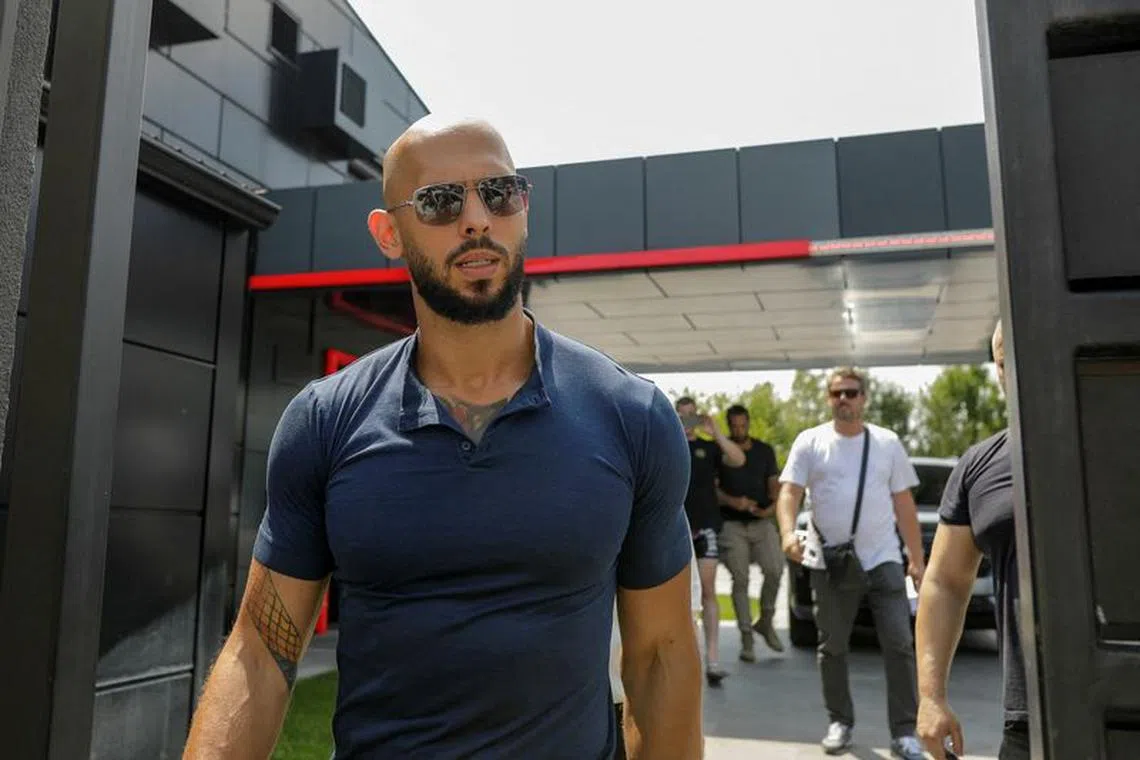 FILE PHOTO: Andrew Tate delivers a press statement outside his house in Voluntari, Ilfov, Romania, August 4, 2023. Inquam Photos/George Calin via REUTERS/File Photo