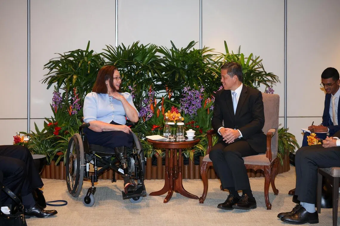 Defence Minister Chan Chun Sing (right) with US Senator Tammy Duckworth on the sidelines of the Shangri-La Dialogue on May 29.