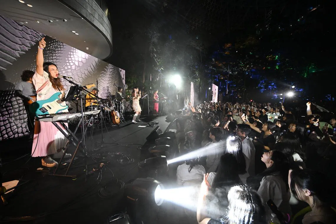Singaporean musicians 53A and Joie Tan  led Taylor Swift fans in a sing-along session  at Jewel Changi Airport.