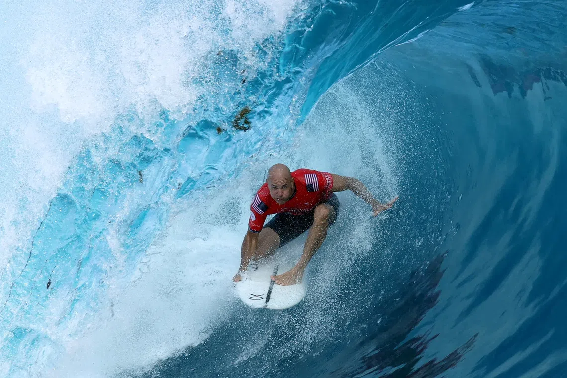 FILE PHOTO: Surfing - World Surf League - Tahiti Pro - Teahupo'o, Tahiti, French Polynesia - May 30, 2024  Kelly Slater of the U.S. in action during the quarterfinals heat 1 REUTERS/Thomas Bevilacqua/File Photo