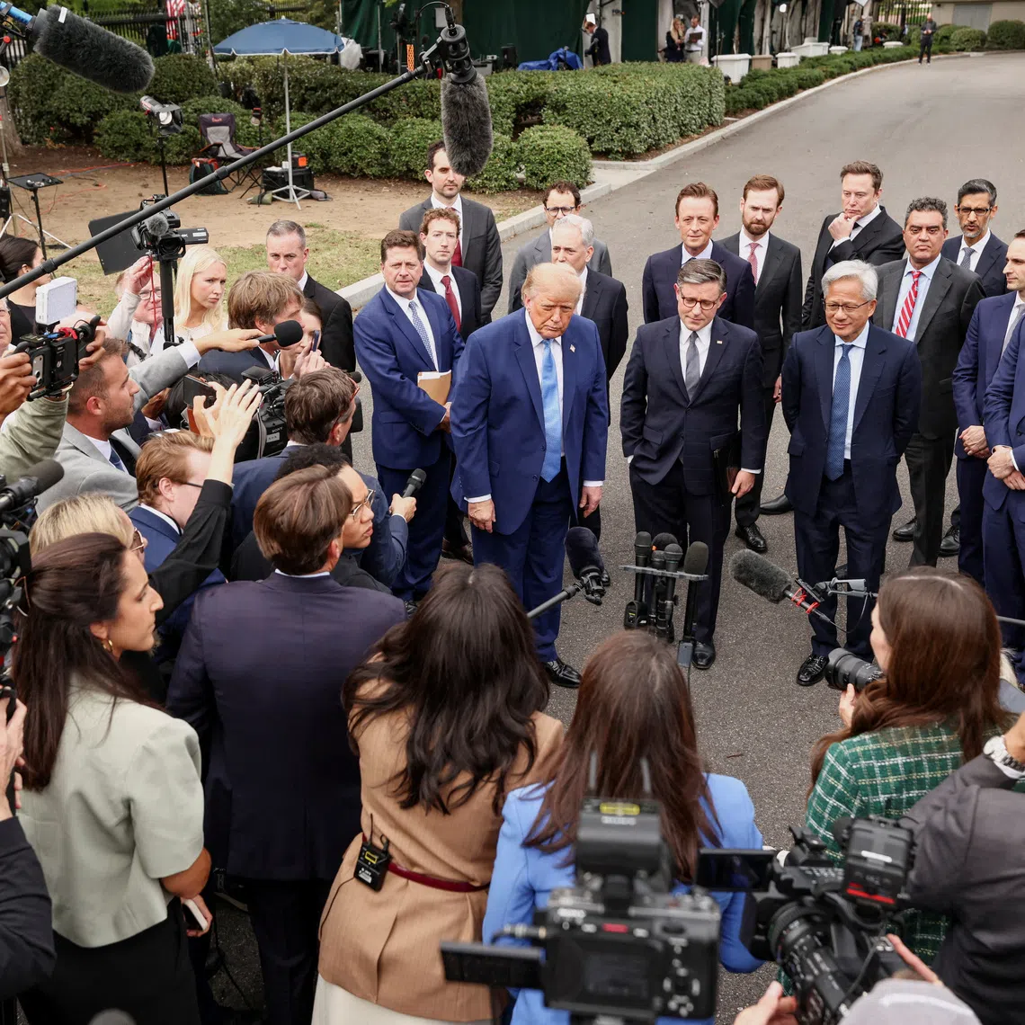 US President Donald Trump speaks to members of the media following a meeting with tech executives on artificial intelligence at the White House, on Sept 29.