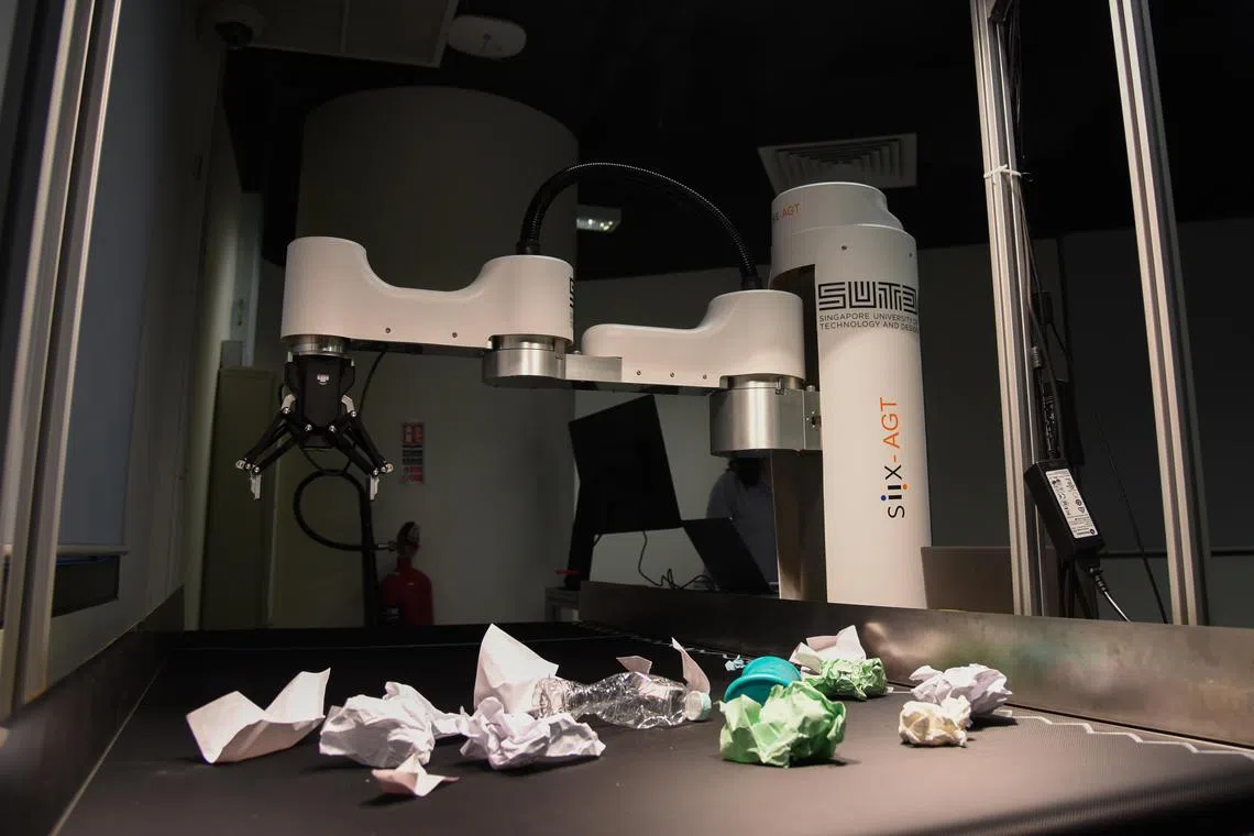 ST20240527_202483857017/ocai02/Heng Yi-Hsin/Osmond Chia/ An AI-assisted robotic arm that can identify and sort different types of plastic using multi-spectral imaging. This robot is developed collaboratively by Sembcorp, A*STAR and SUTD. Photographed at Singapore University of Technology and Design (SUTD) on May 27, 2024. ST PHOTO: HENG YI-HSIN