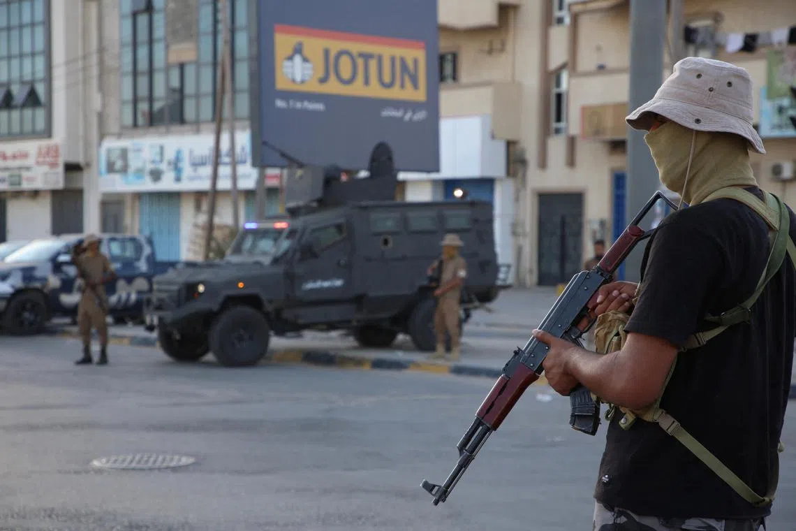Members of the Security personnel affiliated with the Ministry of Interior secure the streets after yesterday's clashes between armed factions in Tripoli, Libya, August 16, 2023 REUTERS/Hazem Ahmed