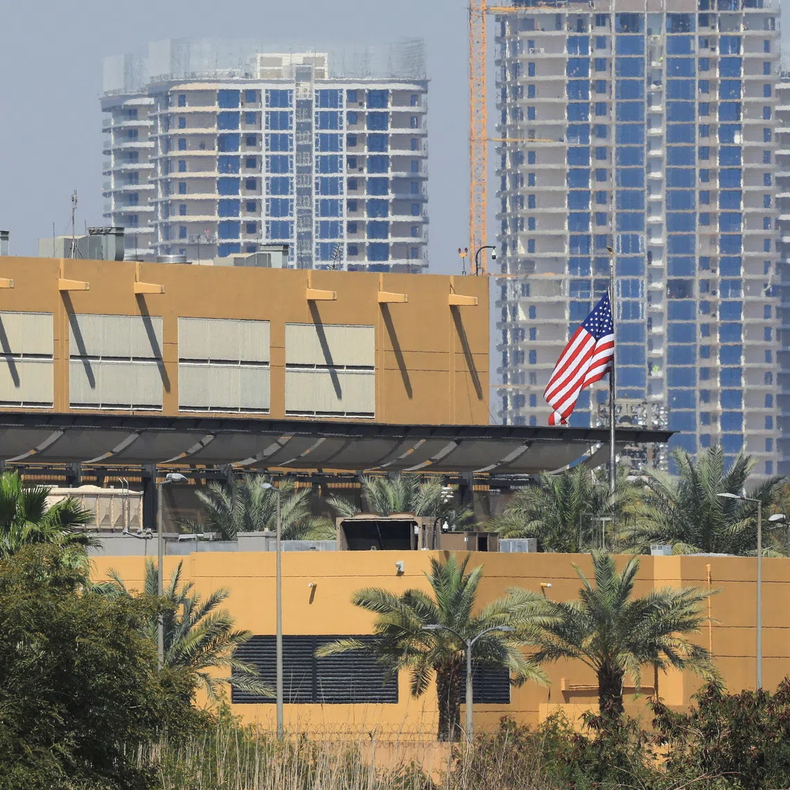The US flag flying at the American embassy in Baghdad, Iraq, on March 17, after the building was targeted with drone and rocket attacks amid the US-Israel war on Iran.