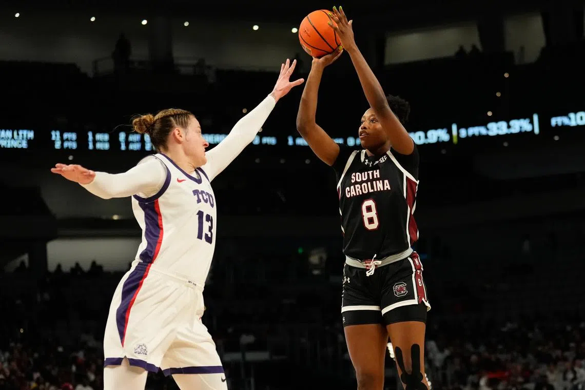 Dec 8, 2024; Fort Worth, Texas, USA;  South Carolina Gamecocks forward Joyce Edwards (8) scores a basket against TCU Horned Frogs center Sedona Prince (13) during the first half at Dickies Arena.  Chris Jones-Imagn Images/File Photo