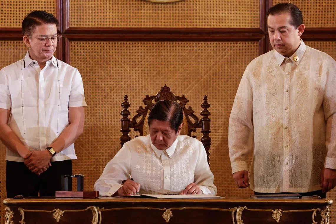 Philippine President Ferdinand Marcos Jr signs new laws meant to strengthen his nation's maritime claims.