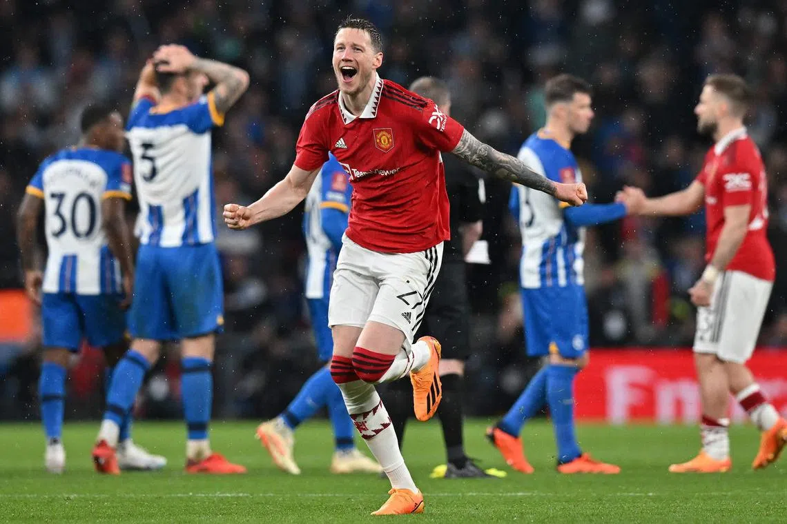 Manchester United's Wout Weghorst celebrating after hitting the winning penalty in the shoot-out against Brighton in their English FA Cup semi-final at Wembley on April 23, 2023. 