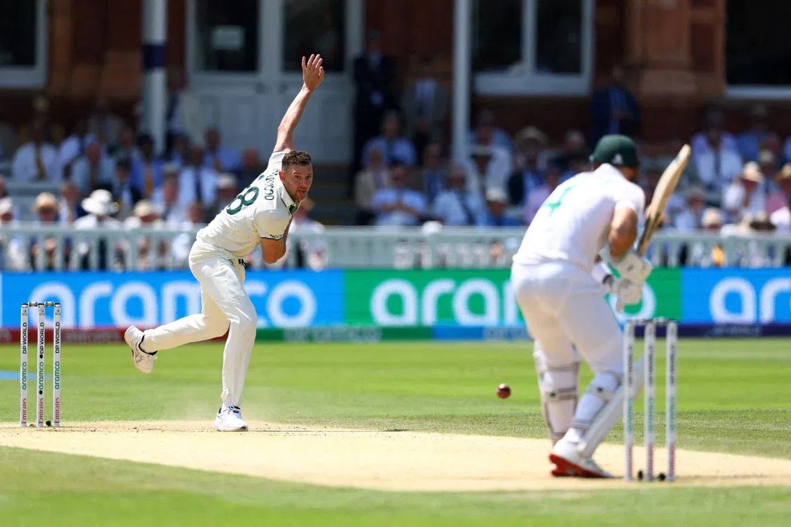 FILE PHOTO: Cricket - 2025 ICC World Test Championship Final - South Africa v Australia - Lord's Cricket Ground, London, Britain - June 13, 2025 Australia's Josh Hazlewood in action bowling Action Images via Reuters/Andrew Boyers/File Photo