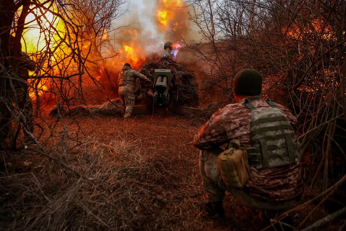 Ukrainian servicemen of the 126th Separate Territorial Defence Brigade fire a D-30 howitzer towards Russian troops at a position in a front line, amid Russia's attack on Ukraine, in Kherson region, Ukraine March 12, 2024. Radio Free Europe/Radio Liberty/Serhii Nuzhnenko via REUTERS/File photo