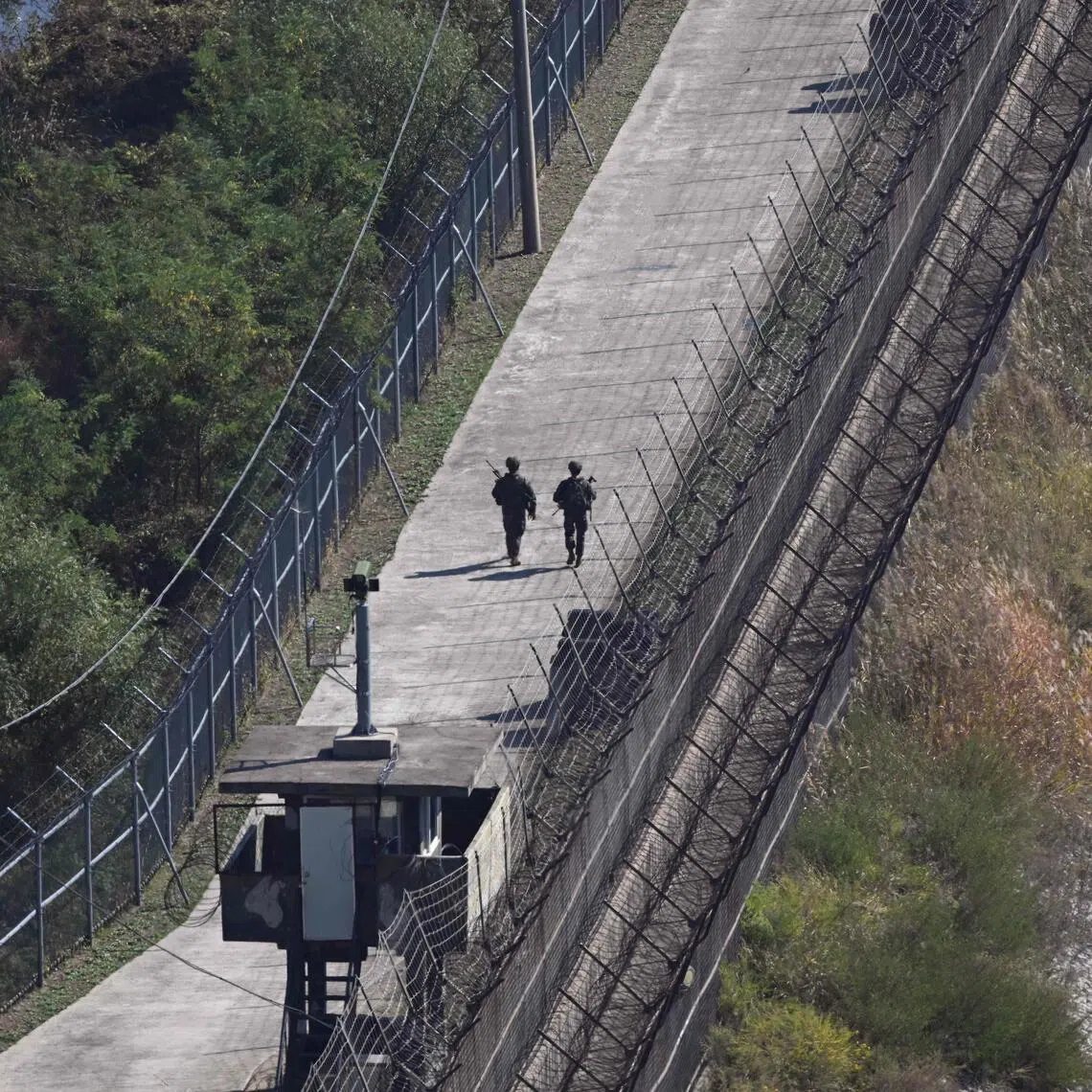 South Korean soldiers patrolling on the south side of the Demilitarised Zone (DMZ) on Oct 20.