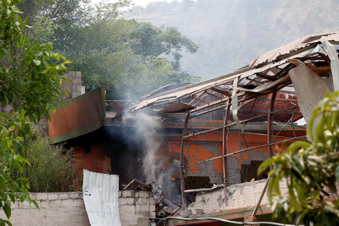 Smoke rises from Bilal Mosque after it was hit by an Indian strike in Muzaffarabad, the capital of Pakistan-administered Kashmir, May 7, 2025. REUTERS/Akhtar Soomro