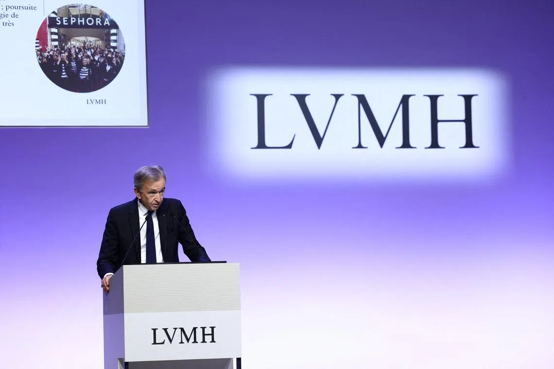 LVMH chairman and CEO Bernard Arnault presenting the group's 2023 annual results in Paris in January. LVMH is one of the 11 stocks whose first letter spell out the word Granolas.